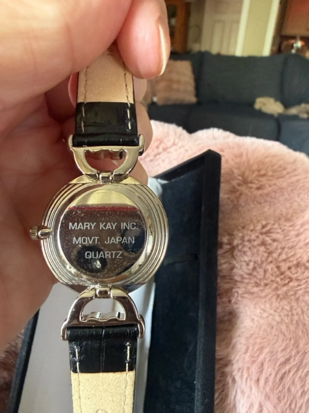 Vintage Avon Quartz Watch two tone with Black Leather Band needs a battery.